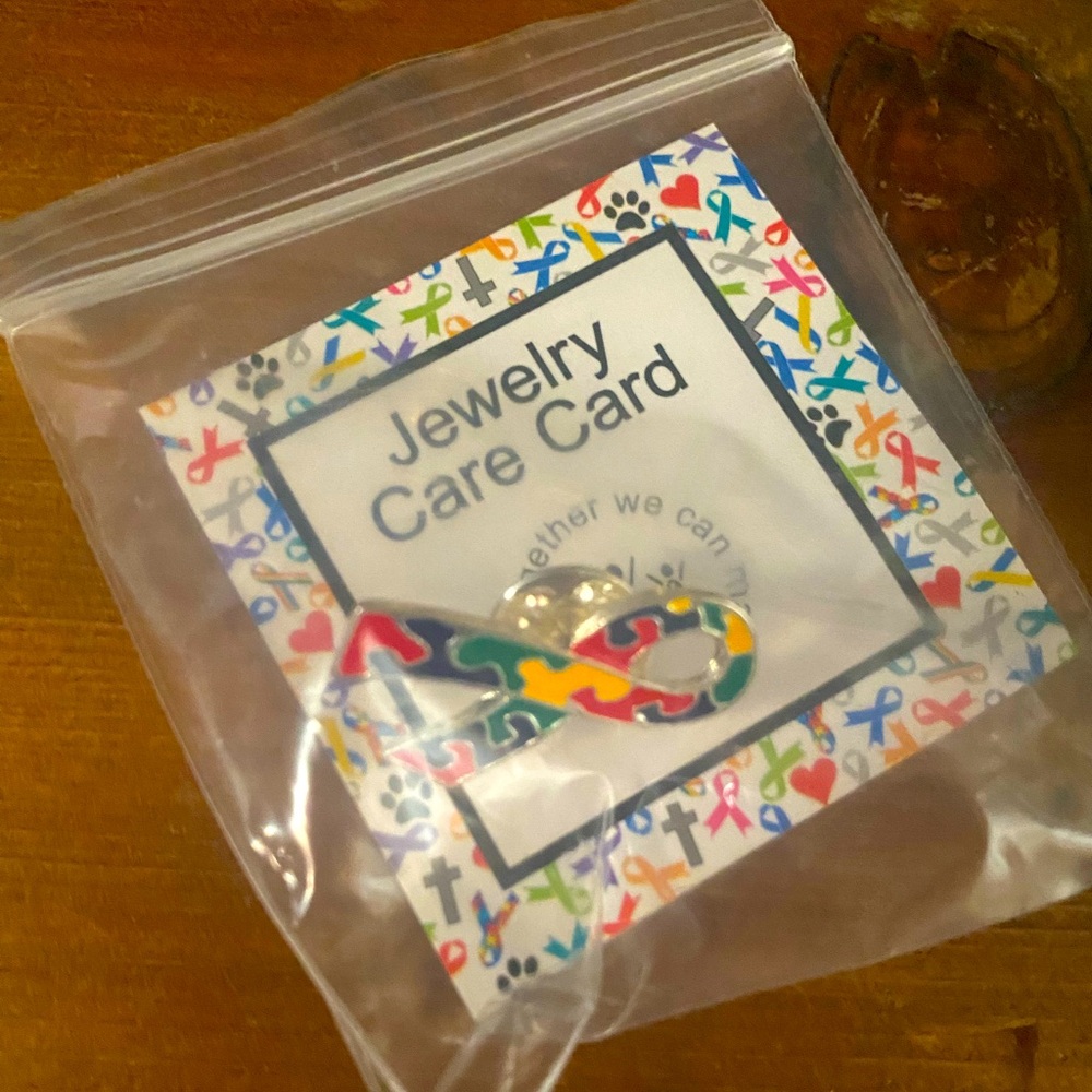Autism awareness puzzle ribbon pin